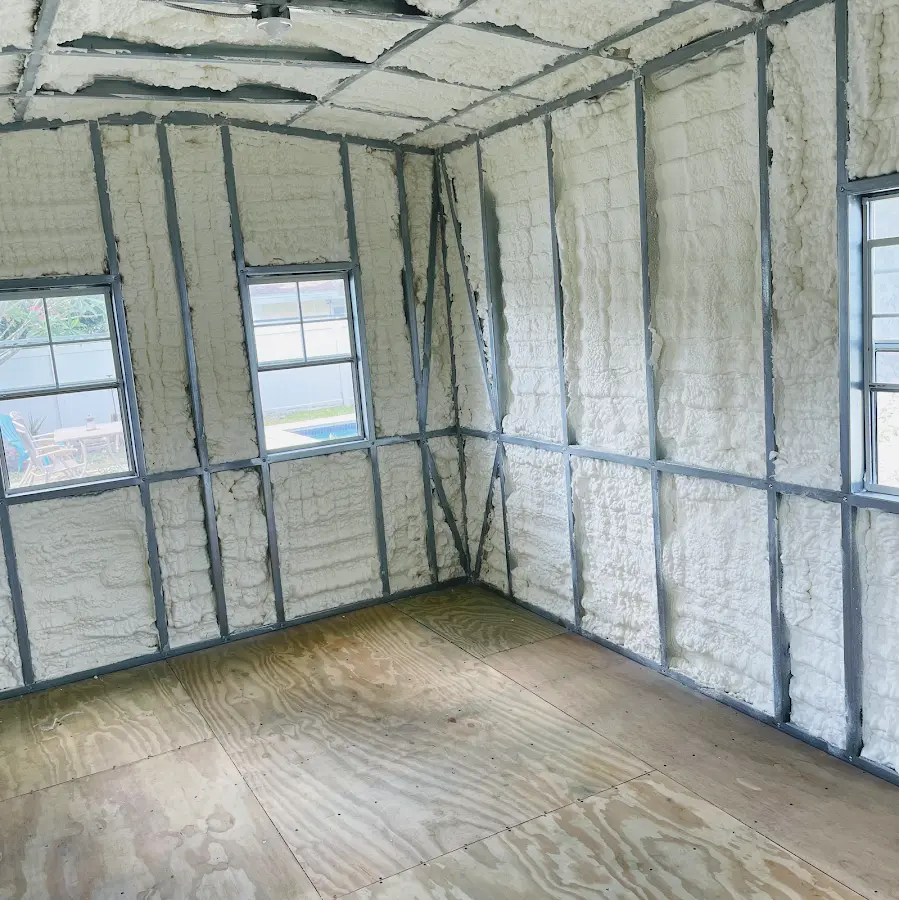 Closed-cell spray foam insulation applied to wall cavities in a residential project in Paw Paw